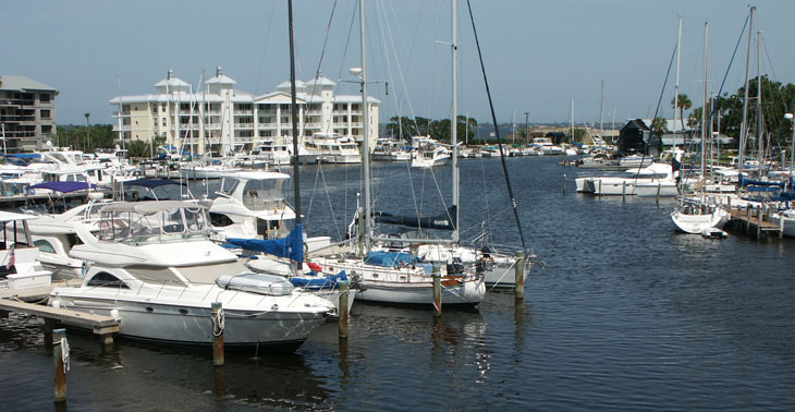 Boats along docks and in the water in Melbourne Harbor and Crane Creek