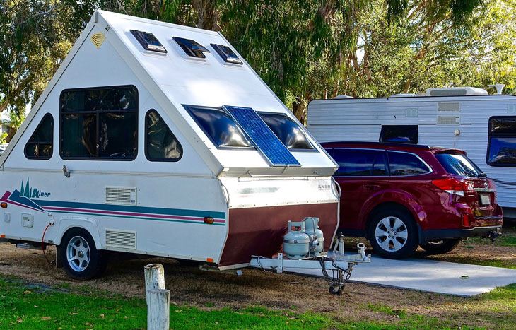 camper and recreational vehicle at campground