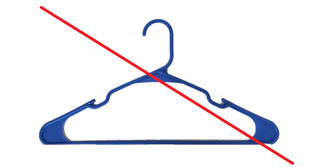 Plastic coat hanger with a red slash through the photo