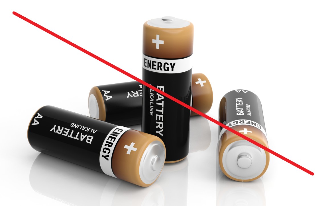 Five AA batteries with a red slash through the photo