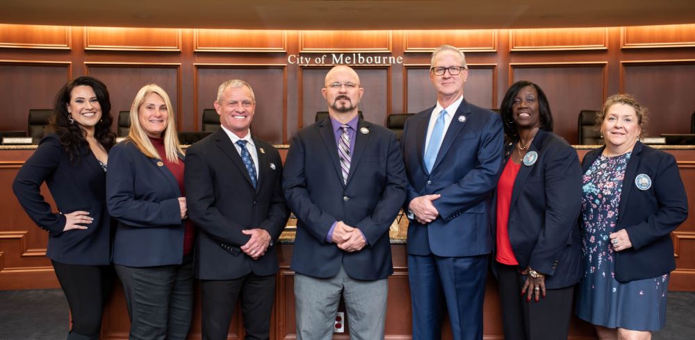 Group picture of City Council members in the Council Chamber