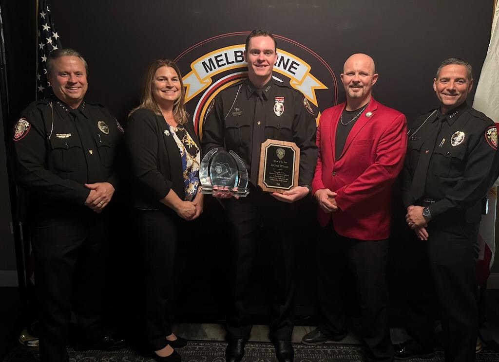 Officer of the Year Jordan Wilson with Chief Gillespie, Deputy Chief Waltemeyer, City Manager Jenni Lamb and Mayor Paul Alfrey