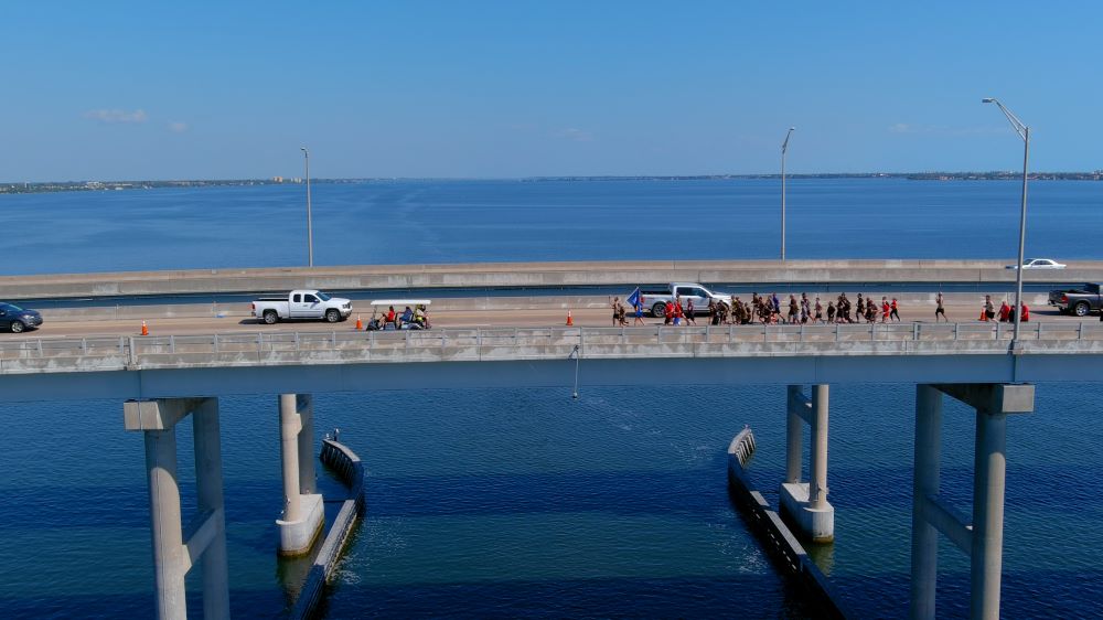 Law Enforcement Torch Run runners on the Melbourne Causeway