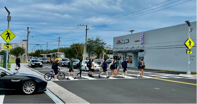 Students walking across new crosswalk on Bulldog Blvd